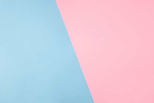 Photo of shared divided into two parts background harmonically soft pastel colored empty space for filling text idea banner billboard pink and blue colors