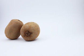 juicy kiwi on a white background. funny smiley with fruits