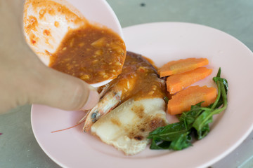 Thai Barbecue Style (Pork Pan).pork on a hot plate