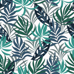 Botanical seamless tropical pattern with bright green plants and leaves on a blue background. Summer colorful hawaiian seamless pattern with tropical plants.  Vector design. Jungle print. Floral backg