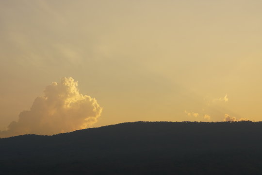 on a hillside at sunset, on the South Downs in thail