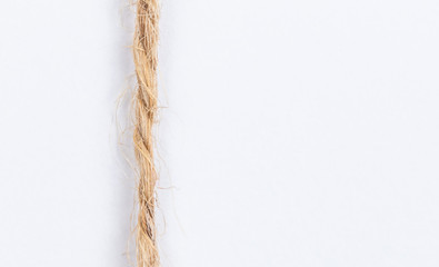 Rope, thread closeup on a white background with empty place for text.