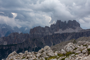 Clouds over the mountains. Mountain alpine landscape. Dolomites, Italy
