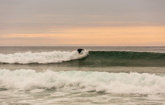 Surfer at sunset