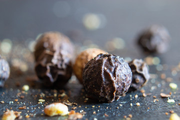 Macro of white pepper and black pepper