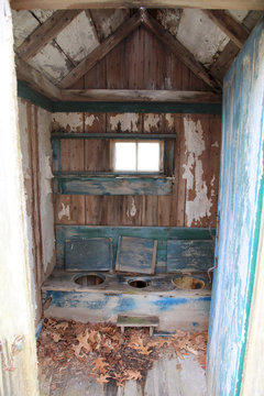 Old Fashioned Outhouse Interior