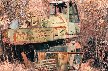 abandoned broken equipment in the Chernobyl forest