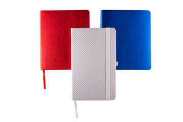 Red and blue notebook with grey notebook
