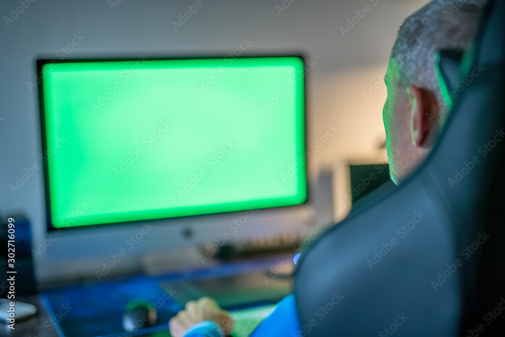 Sticker young man with eyeglasses working at his home desk with green screen