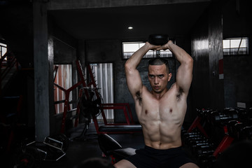 Portrait of asian man big muscle at the gym,Thailand people,Workout for good healthy,Body weight...