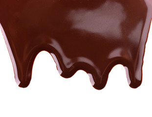Chocolate streams isolated on white background. Chocolate syrup, topping, dark chocolate.