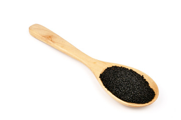 Lemon basil seeds in wooden spoon isolated on white background.food for help Reduce Cholesterol Levels For those who need to control weight