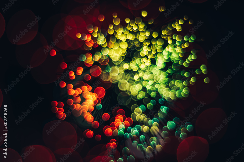 Poster beautiful abstract optical light bokeh on a glow background.