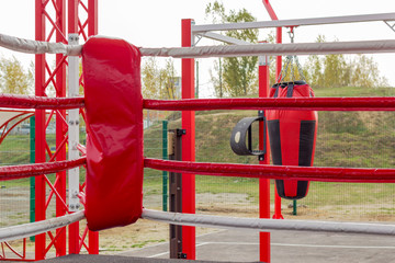Boxing ring outdoors. Boxing lessons. Healthy lifestyle.