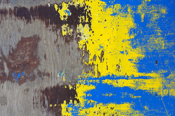 the texture of peeling paint is blue-yellow