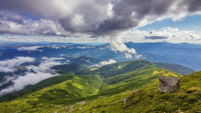 Timelapse of beautiful summer landscape in mountains with clouds