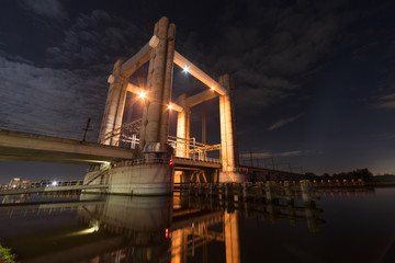 Railway lifting bridge over a river in Holland