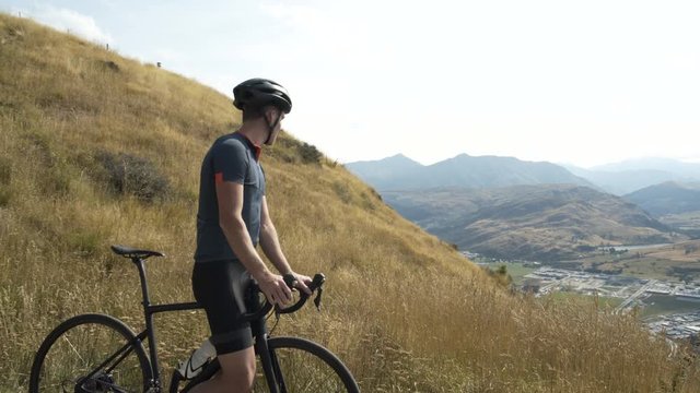 Male Enjoying View Bike Ride Queenstown New Zealand