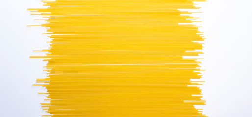 Dry spaghetti on a white background. Italian pasta. A place to copy. Food and healthy eating....