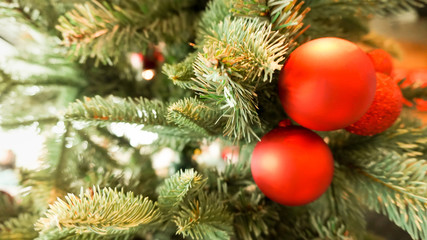Christmas tree decoration bright red balls.        