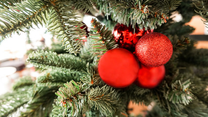 Obraz na płótnie Canvas Christmas tree decoration bright red balls. 