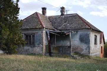 an old abandoned, dilapidated house