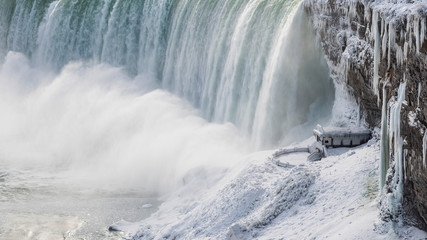 Fototapeta na wymiar Frigid Falls - Niagara in Winter