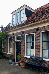 View of historical, traditional and typical house in Edam. It is a town famous for its semi hard cheese in the northwest Netherlands, in the province of North Holland.