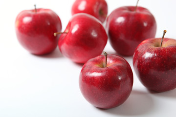 ripe juicy red apples on the table.