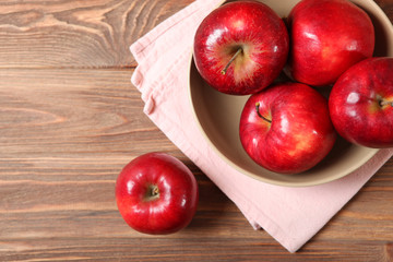 ripe juicy red apples on the table.