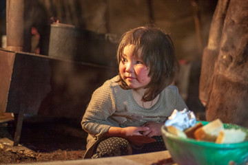 The extreme north, Yamal, the pasture of Nenets people, children on vacation playing near reindeer...