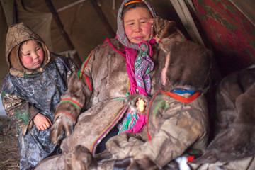 The extreme north, Yamal, the past of Nenets people, the dwelling of the peoples of the north, a  photo in the yurt ;artistic noise, - obrazy, fototapety, plakaty