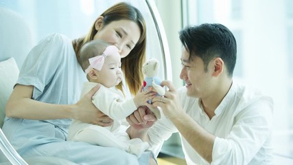 Chinese Asian mother father baby caring time together