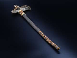 Replicas of the primal stone tools with wooden handles and leather strapping isolated on black...