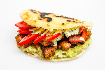 Arepas - Traditional Colombian Food originally from Latin America mixed with  meat, vegetable and special avocado sauce. Isolated on white Background