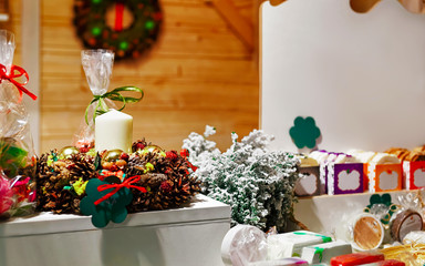 Stall with Handmade soap at different shapes at the stall at the Christmas Market in Vilnius in Lithuania. Street Xmas holiday fair. Advent Decoration and Stalls with Crafts Items on Bazaar