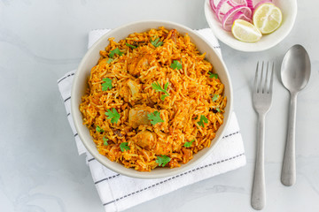 Indian Chicken Pulao, Chicken Fried Rice with Lemon and Onion, Top View Food Photography.