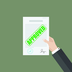 Businessman hand hold approved document
