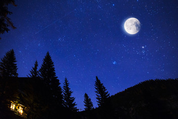 Starry sky and full moon over the Alps, Italy
