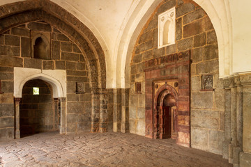 Fototapeta na wymiar Inside view on Main Entrance of Tomb of Isa Khan. UNESCO World Heritage in Delhi, India. Asia.
