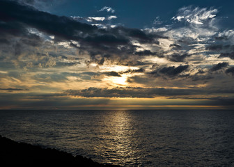 Dramatic sunset over water