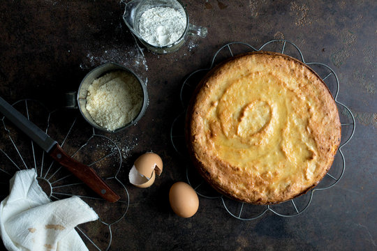 Overhead view of lemon cake and ingredients