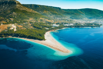 aerial view of island in the sea - obrazy, fototapety, plakaty