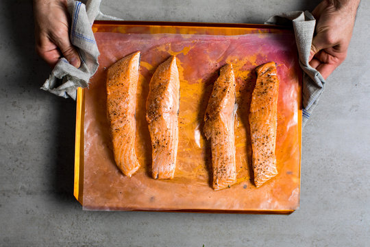 Slices of king salmon on baking tray