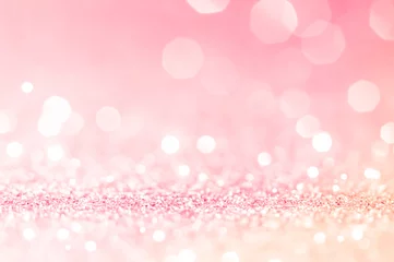 Rosa Gold, rosa Bokeh, kreisförmiger abstrakter heller Hintergrund, rosa Gold leuchtende Lichter, funkelnder glitzernder Valentinstag, Frauentag oder romantische Kulisse für Veranstaltungslichter. Verschwommener abstrakter Feiertagshintergrund. © nongnuch_l