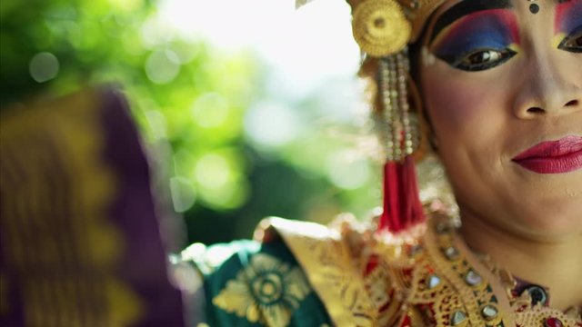 Portrait of young Indonesian female Balinese spiritual dancer 