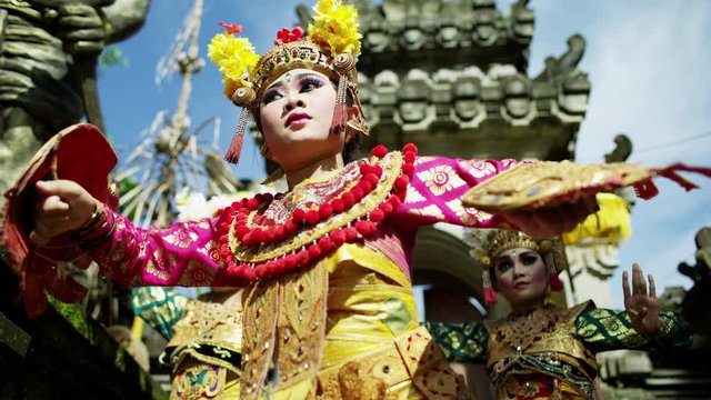 Three beautiful artistic Balinese spiritual dance performers Indonesia