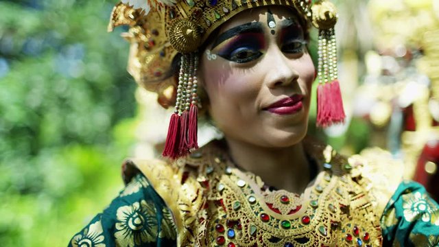 Portrait beautiful Balinese female performing ancient artistic dance 