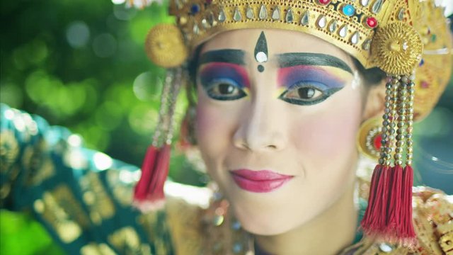 Portrait of young Indonesian female Balinese spiritual dancer 