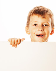 little cute boy holding empty shit to copyspace isolated close up gesturing smiling